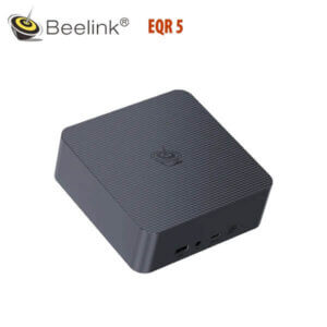 A sleek, compact black mini PC with a textured surface, featuring various ports for connectivity.